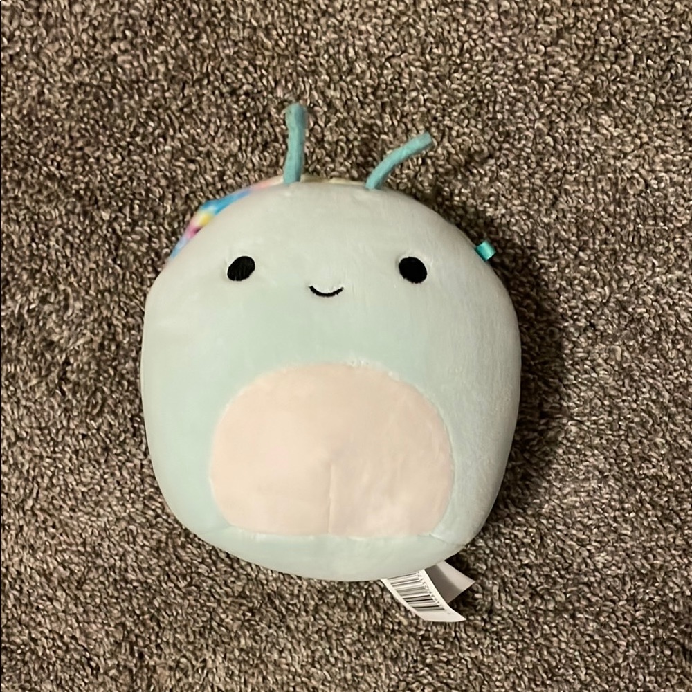Squishmallows light blue and tie dye snail.